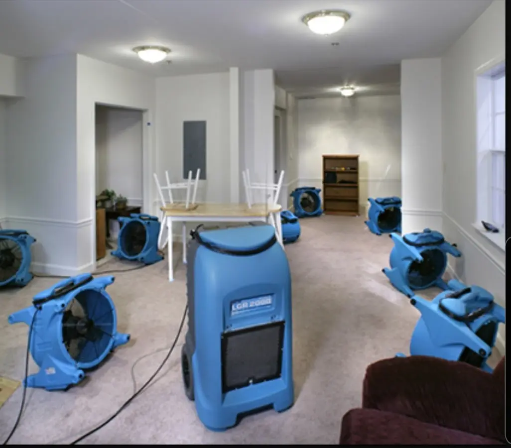 Air movers and dehumidifier setup for Water Damage Restoration in Andrews